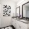 bathroom with a large mirror and walk-in shower