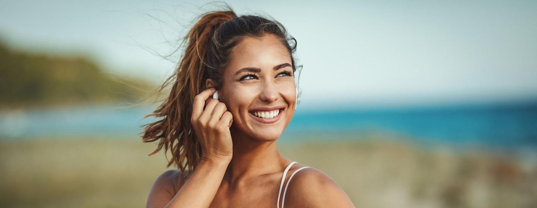 woman out for exercise at the beach